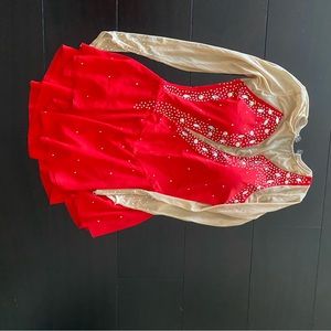red figure skating dress with embellishments
